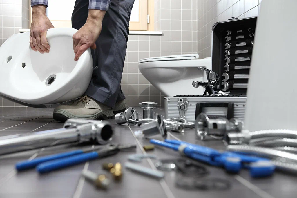 Plumbing tools prepared for a bathroom repair in Fort Pierce